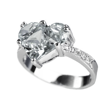 beautiful ring with pink gem isolated on white